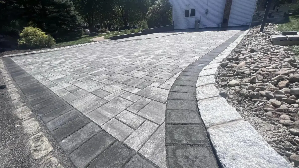 Broad paver driveway with a contrasting border
