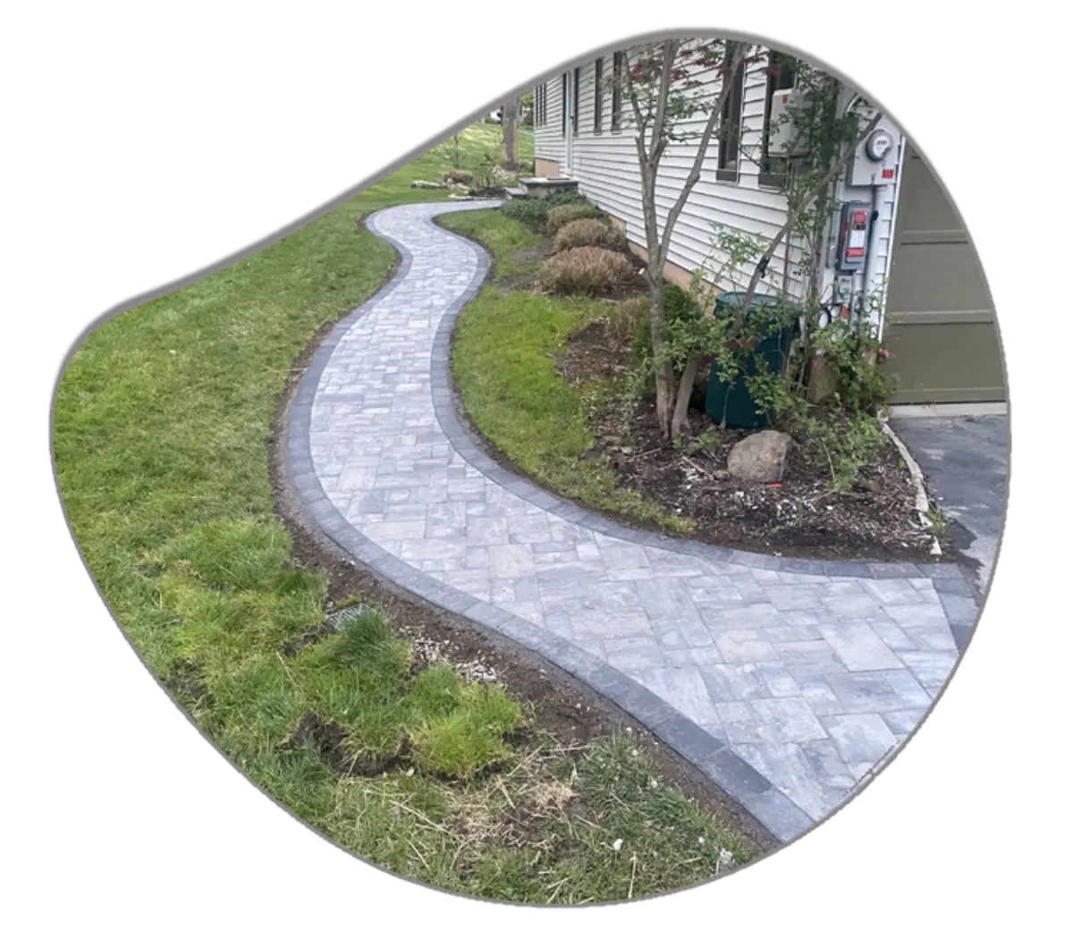 Curving paver walkway with a contrasting edge