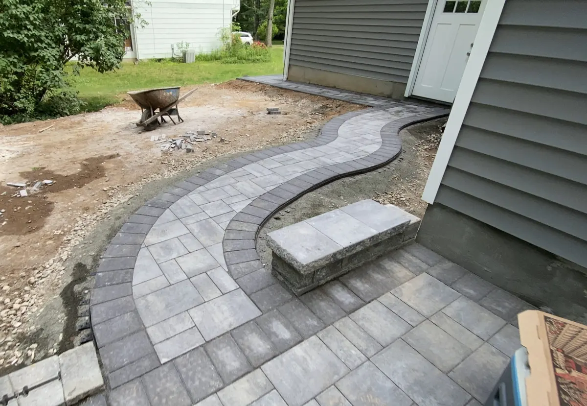 Curved front walkway during paver installation